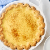 overhead view of sugar cream pie in a white pie plate