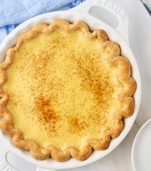 overhead view of sugar cream pie in a white pie plate