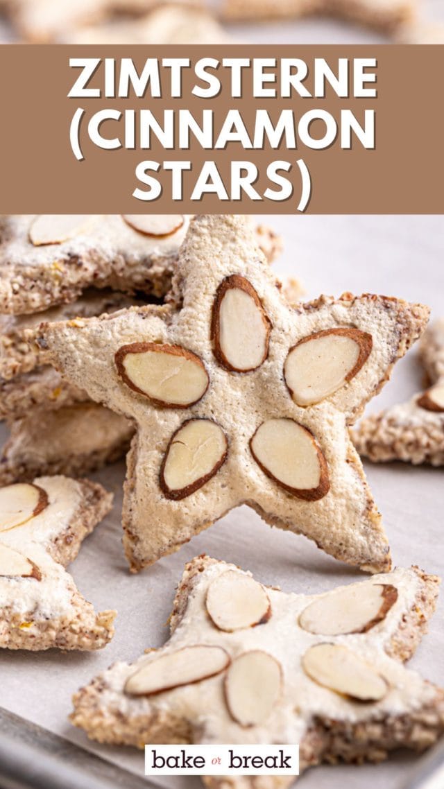 a zimtsterne cookie propped against a stack of cookies; text overlay "zimtsterne (cinnamon stars)"