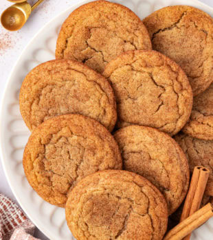 overhead view of brown butter snickerdoodles on a white plate