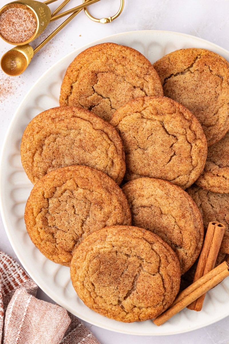 overhead view of brown butter snickerdoodles on a white plate