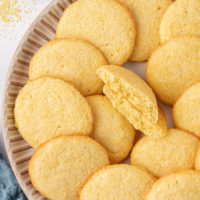 overhead view of cornmeal cookies on a large plate