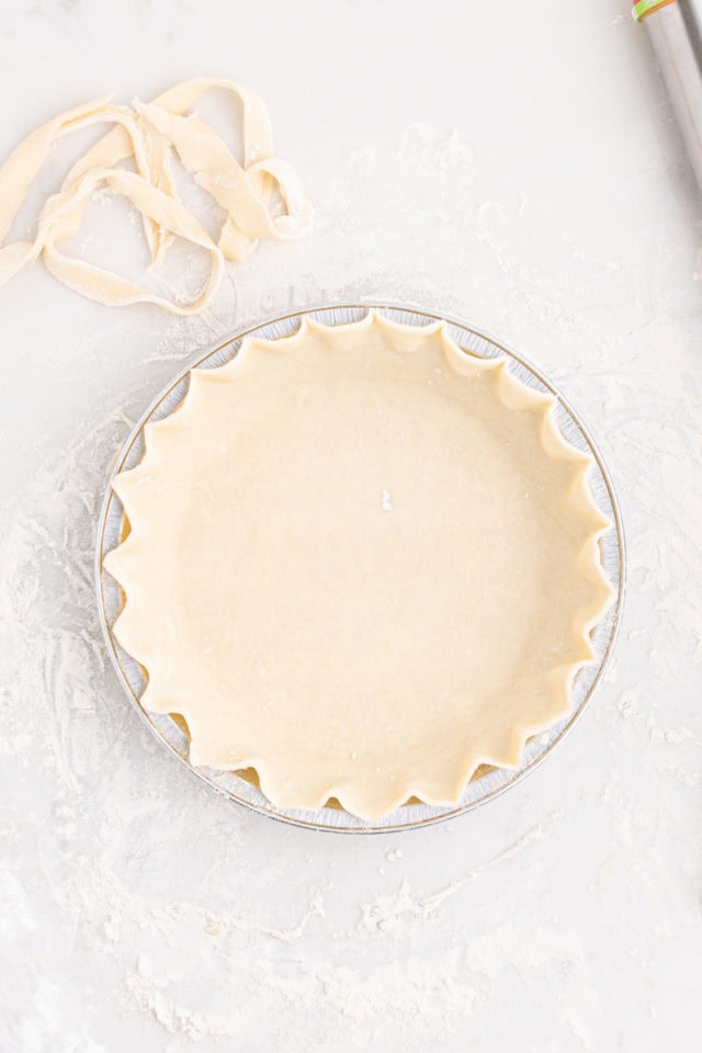 overhead view of pie crust fitted into a pie plate