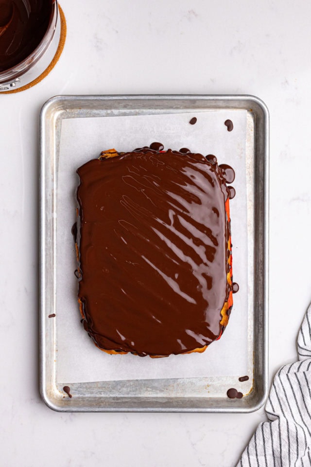 overhead view of chocolate spread on other side of Italian rainbow cookies