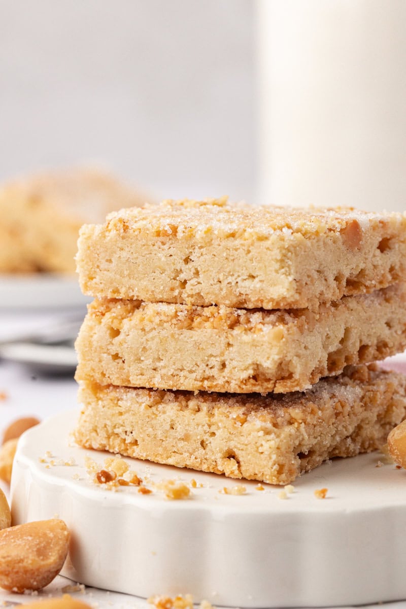 a stack of three macadamia shortbread on a white plate