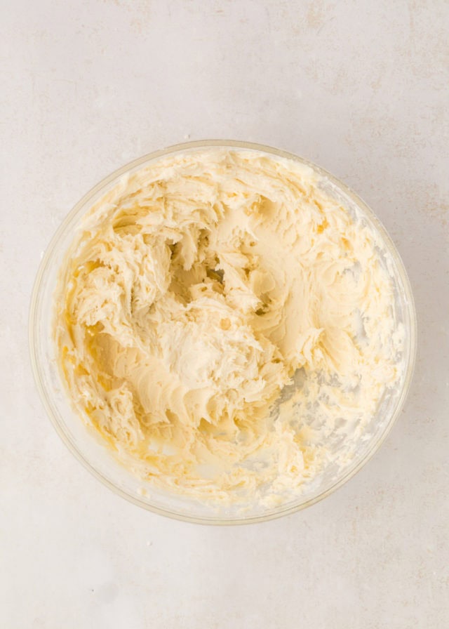 overhead view of mixed peppermint meltaway cookie dough in a mixing bowl