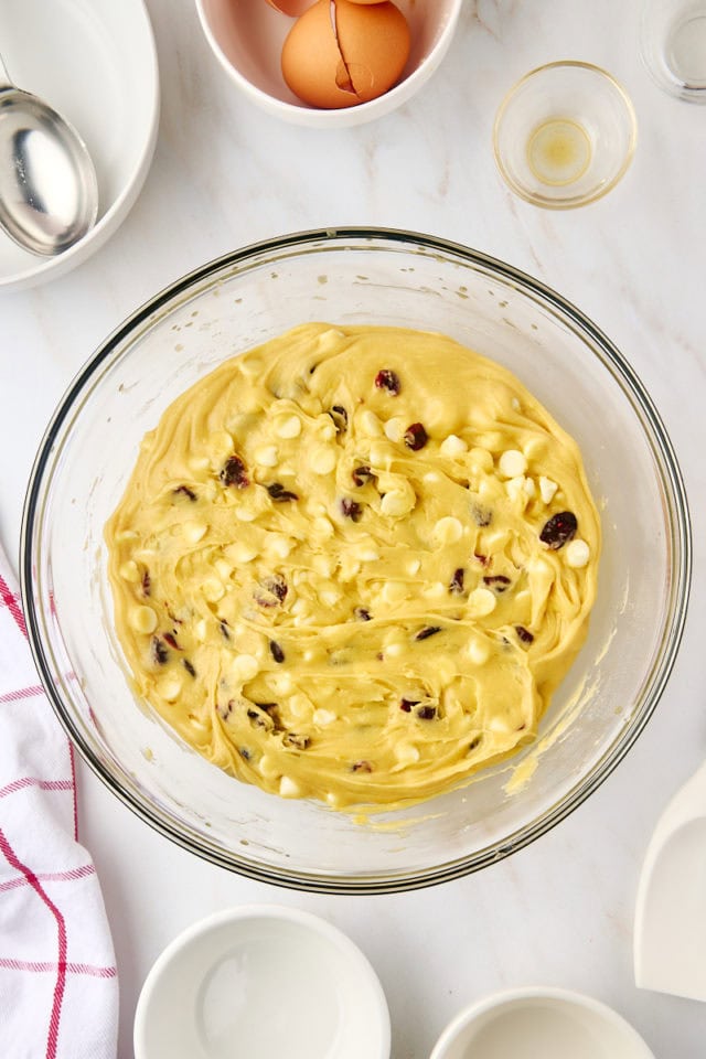 overhead view of mixed cranberry bliss bar batter in a mixing bowl