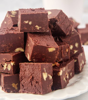 several pieces of fudge on a white plate