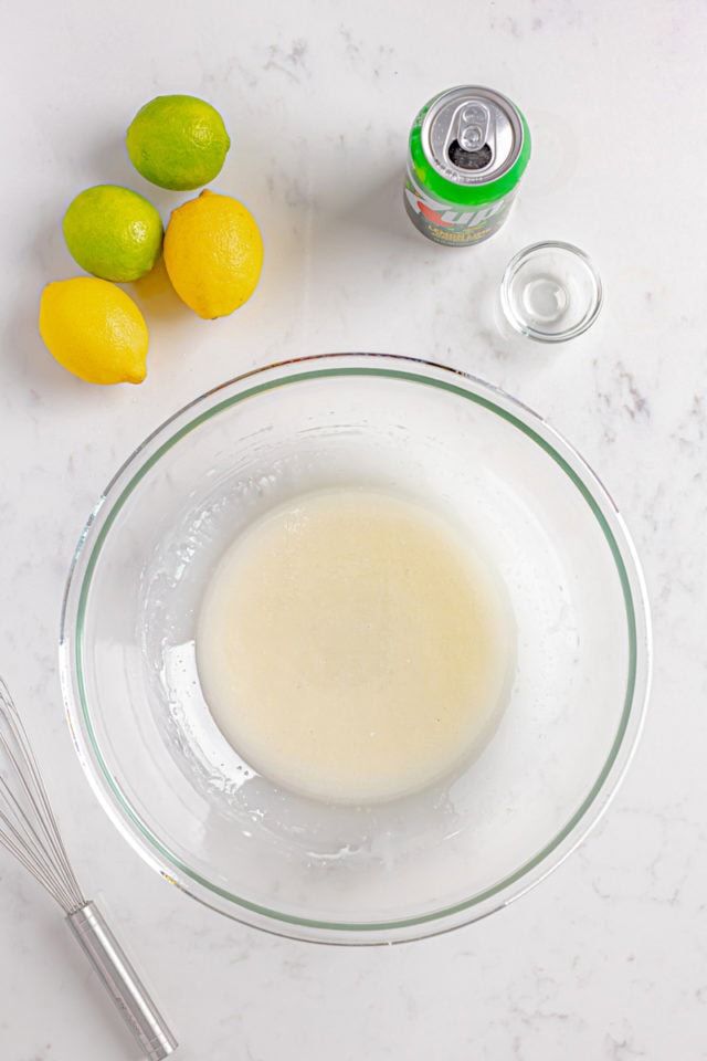 overhead view of glaze for 7UP cake in a glass bowl