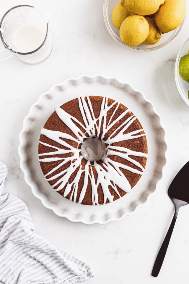 overhead view of glazed 7UP cake on a white cake plate