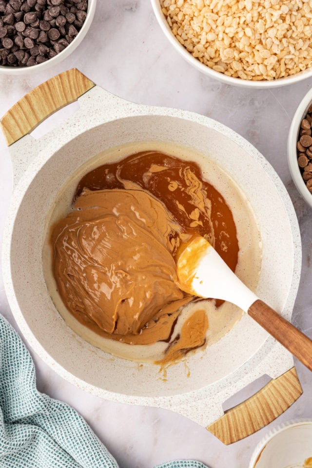 overhead view of peanut butter added to heated honey and sugar