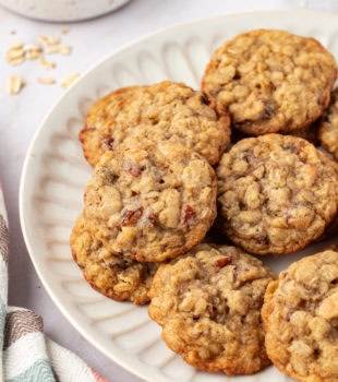 several oatmeal date cookies on a white plate