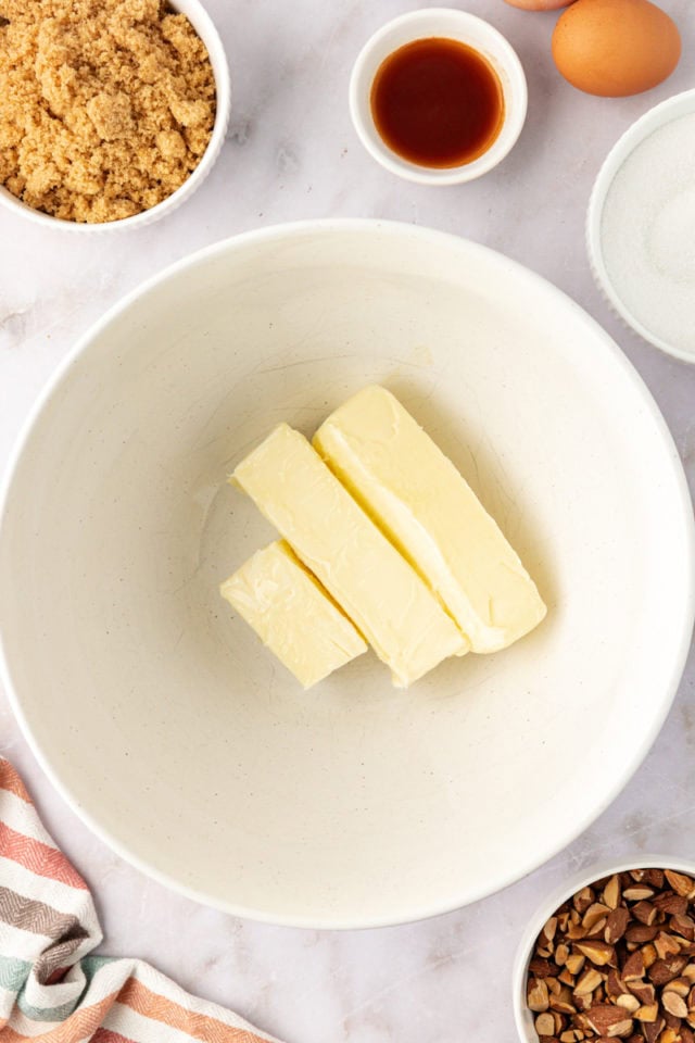 overhead view of softened butter in a white bowl