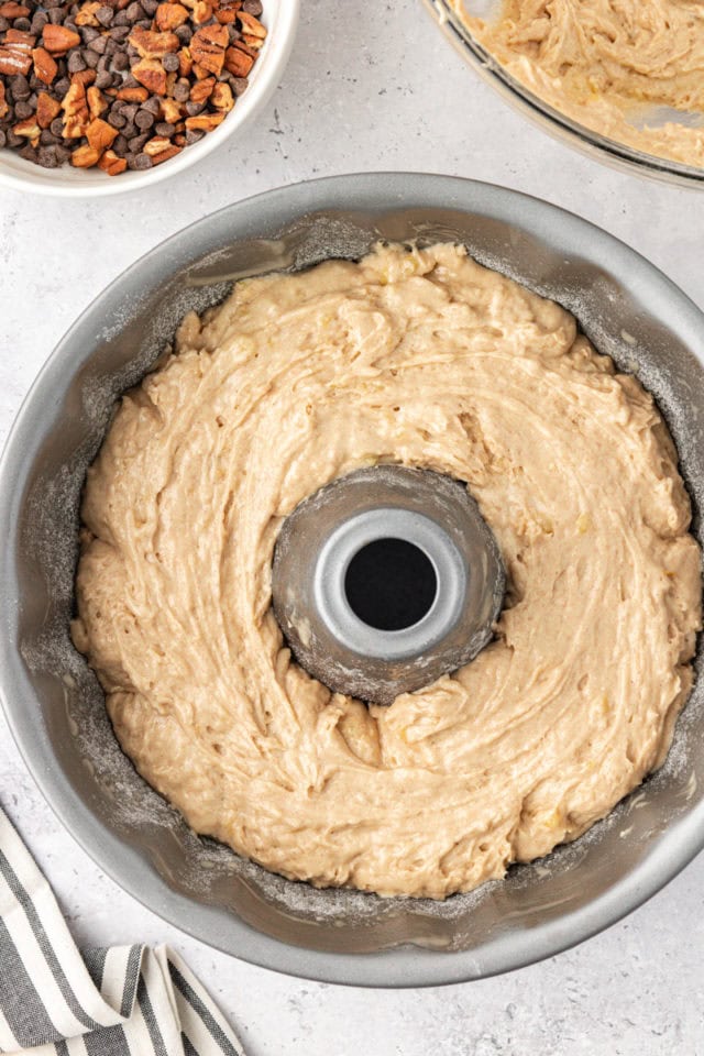 overhead view of first layer of banana coffee cake batter in a Bundt pan