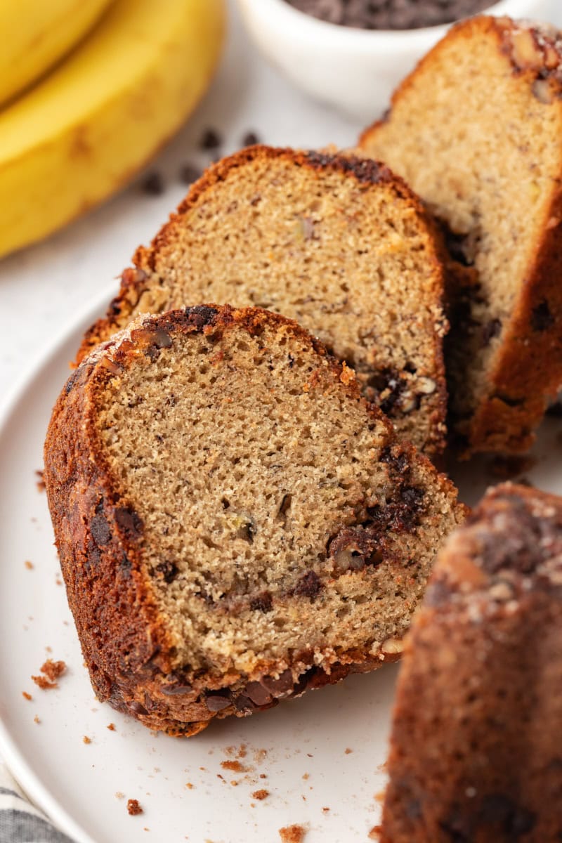 slices of banana coffee cake on a white cake plate