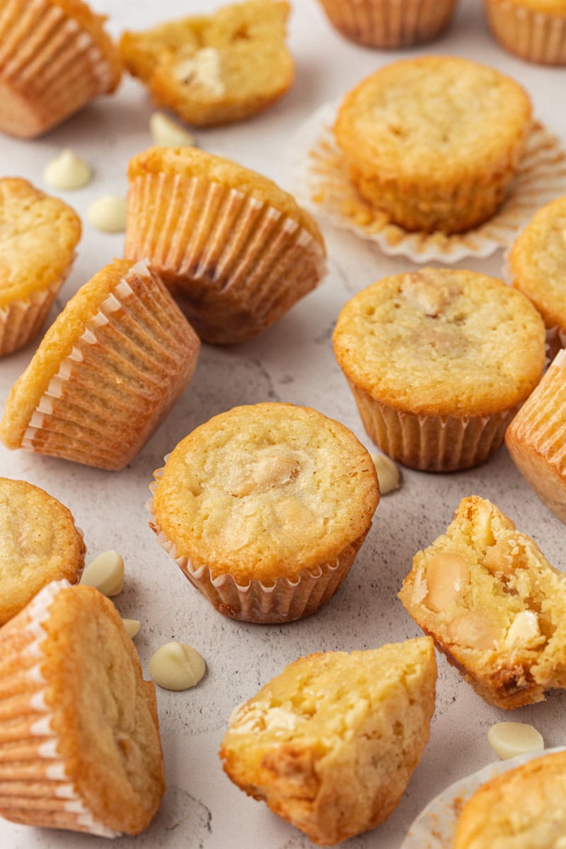 white chocolate blondies scattered on a white surface