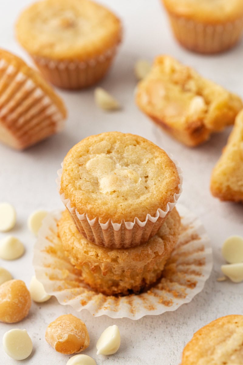 stack of two white chocolate blondies with more blondies in the background