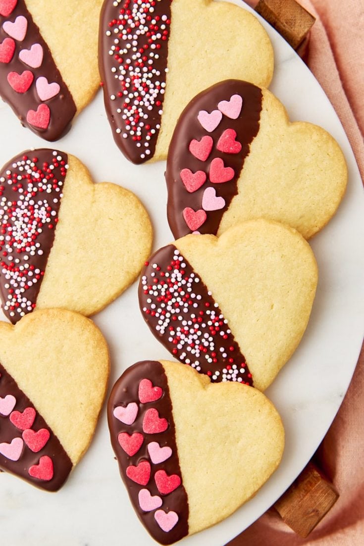 chocolate-dipped shortbread cookies on a white plate