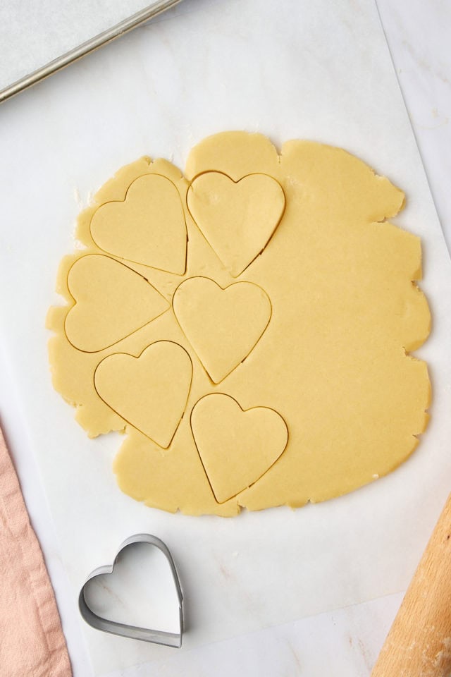 overhead view of rolled and partially cut out shortbread dough