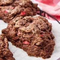 chocolate strawberry scones on a white plate