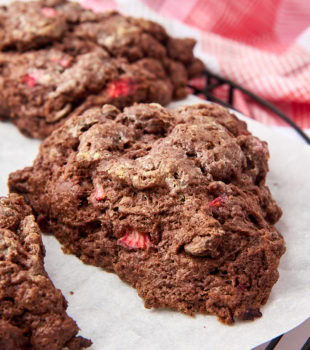 chocolate strawberry scones on a white plate