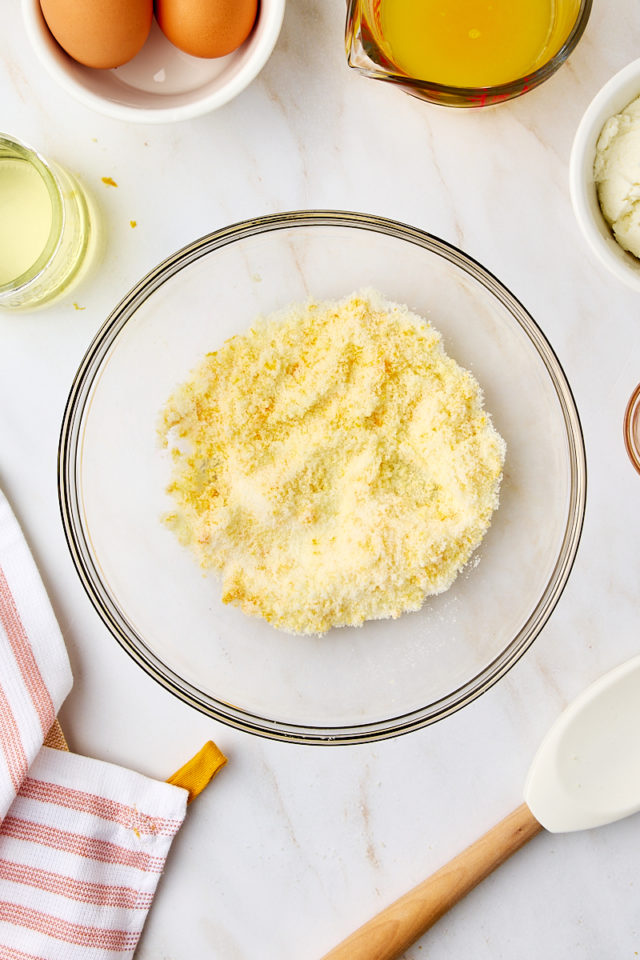 overhead view of orange zest mixed with sugar