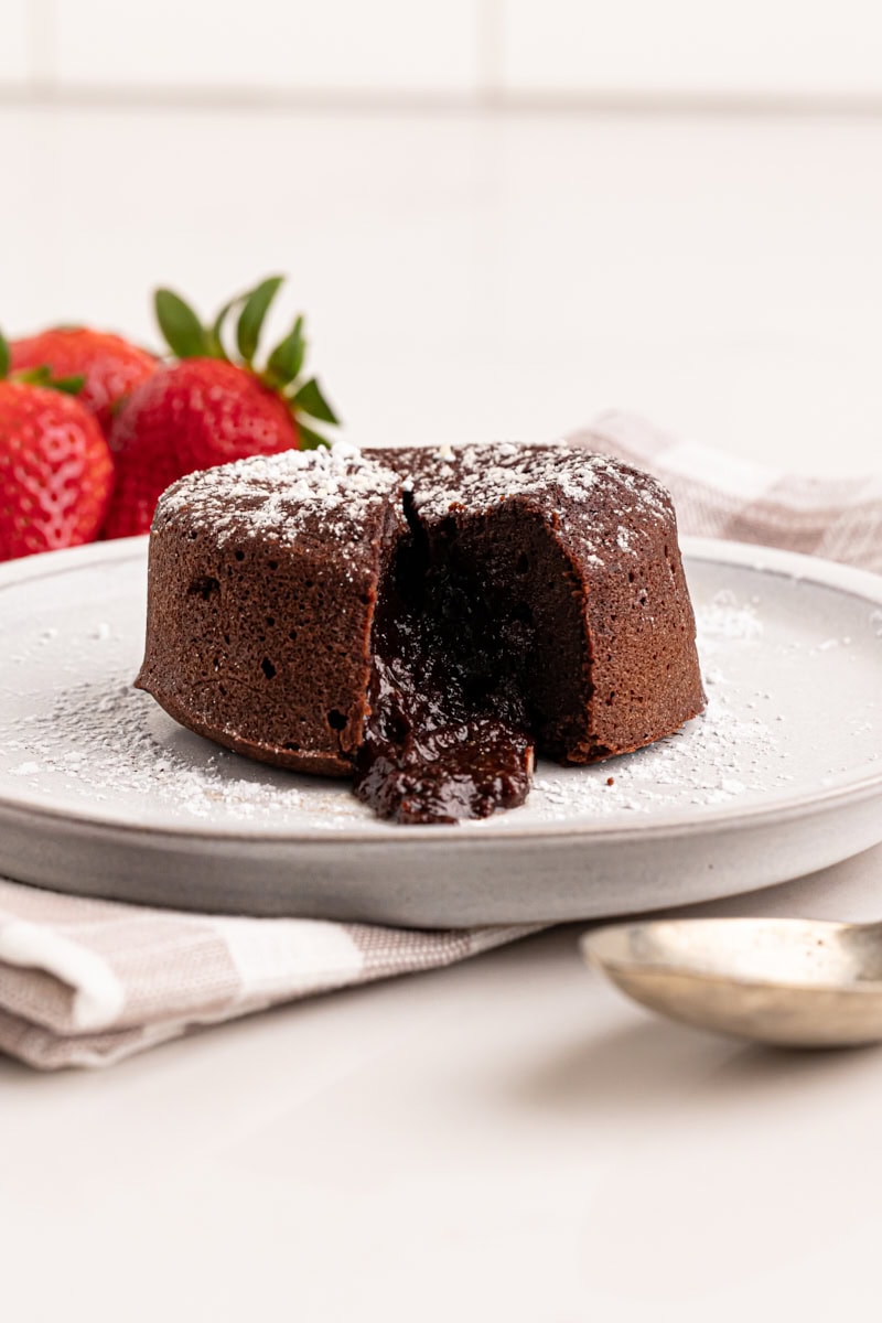 a chocolate lava cake on a white plate