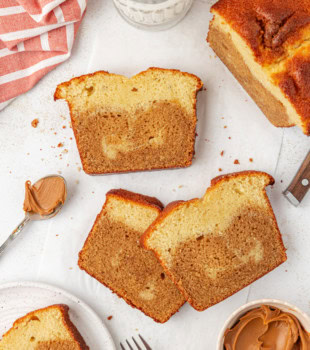 several slices of marbled cookie butter cake on a white countertop