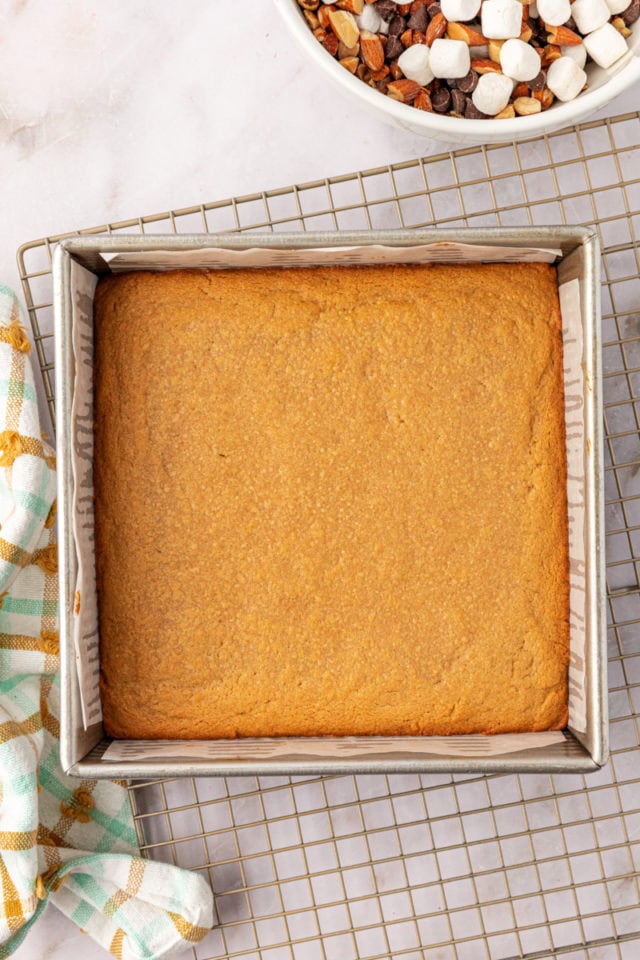 overhead view of freshly baked peanut butter cookie dough in a square baking pan