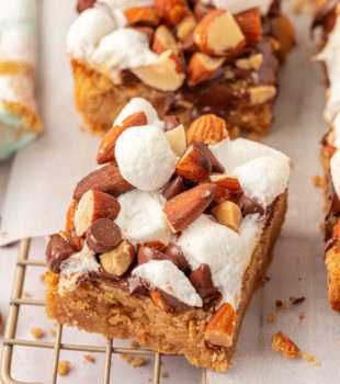 a peanut butter rocky road bar on a wire rack