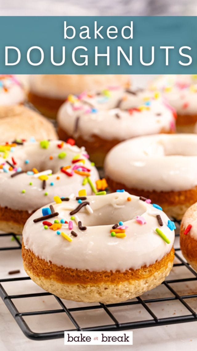 baked doughnuts on a wire rack; text overlay "baked doughnuts"