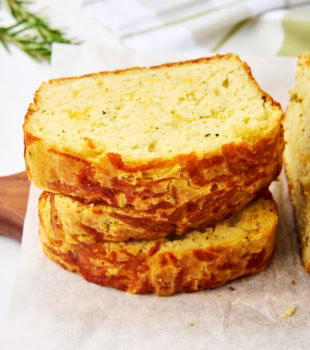 stack of three slices of herb and cheese quick bread