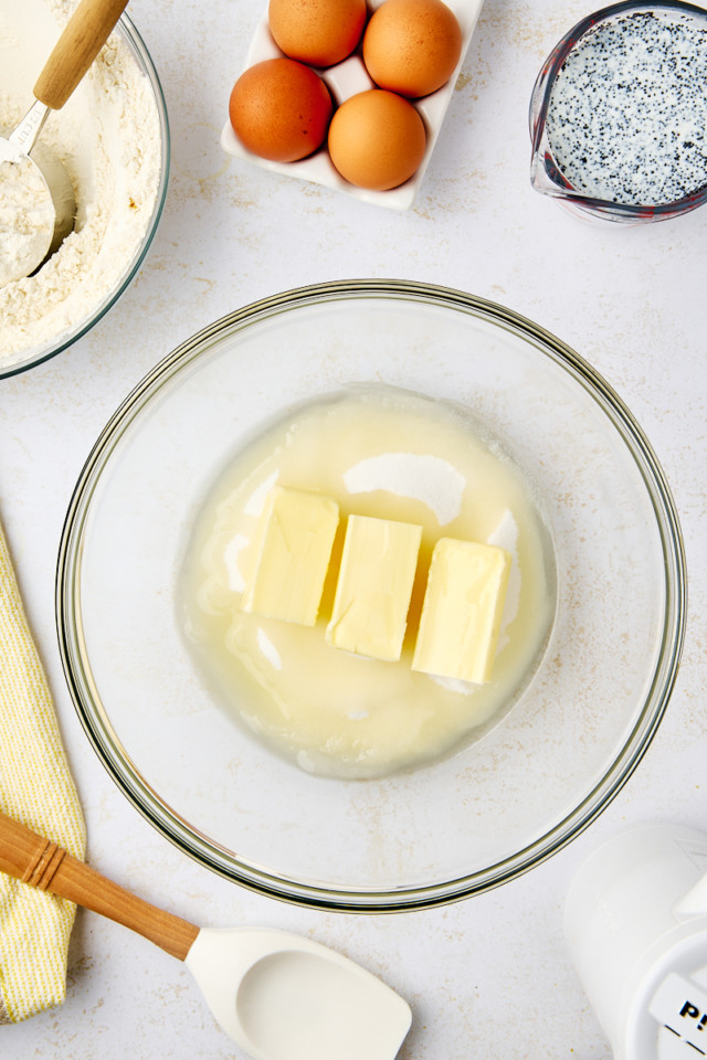 overhead view of butter, sugar, and vegetable oil in a mixing bowl