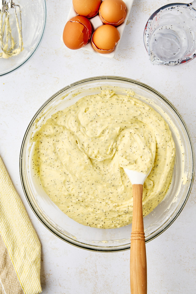 overhead view of lemon poppy seed cake batter in a mixing bowl