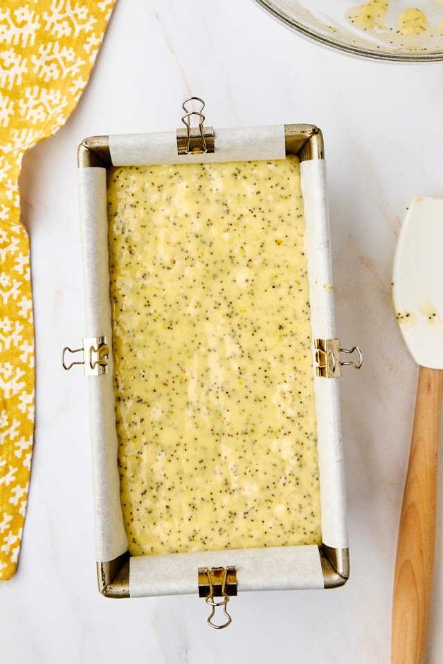 overhead view of lemon poppy seed loaf in a loaf pan ready to go into the oven