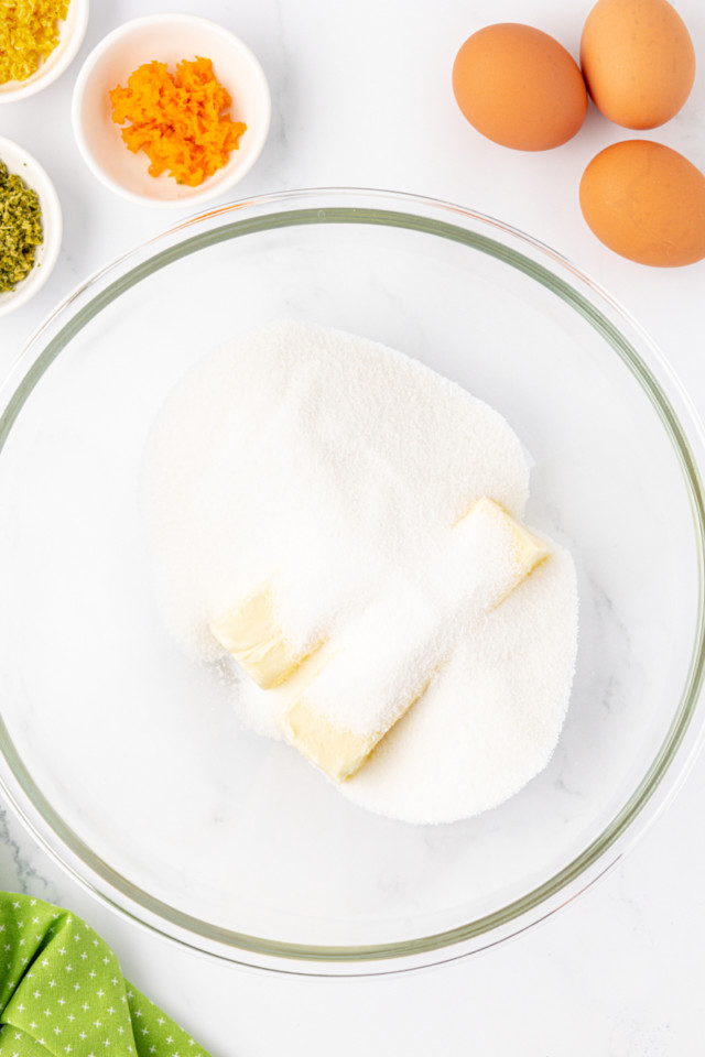 overhead view of butter and sugar in a mixing bowl