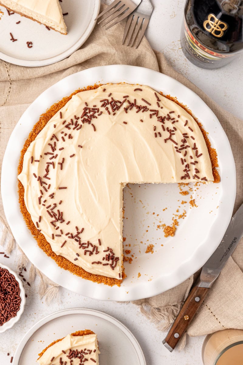 overhead view of no-bake Bailey's cheesecake with two slices missing