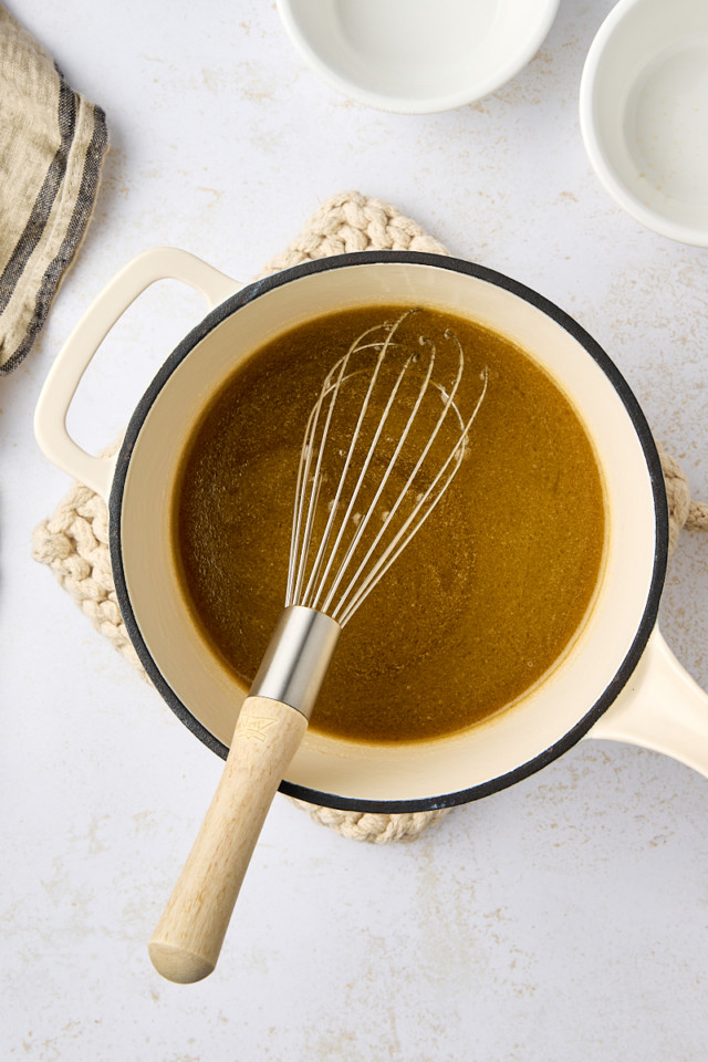 overhead view of melted butter, Guinness, and sugars mixed together in a saucepan