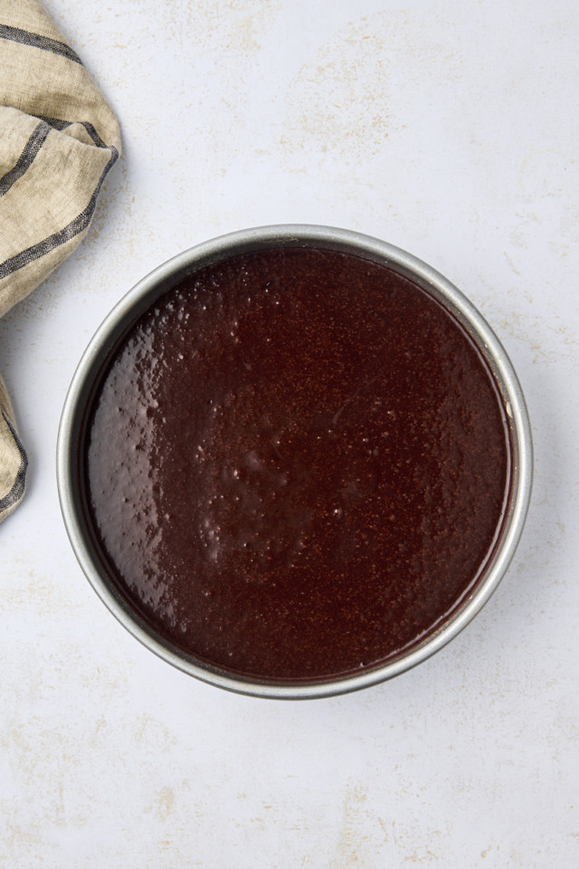 overhead view of Guinness chocolate cake batter in a cake pan ready to go into the oven