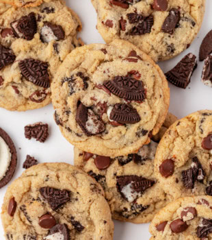 overhead view of Oreo chocolate chip cookies scattered on a white surface