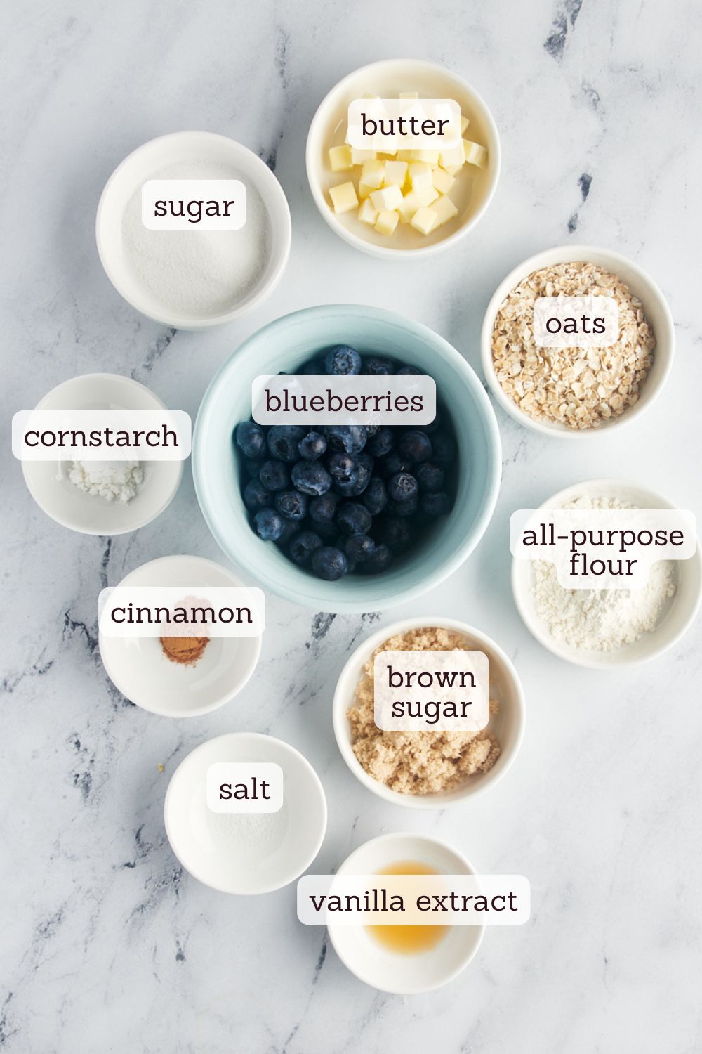 overhead view of ingredients for blueberry crisp for two