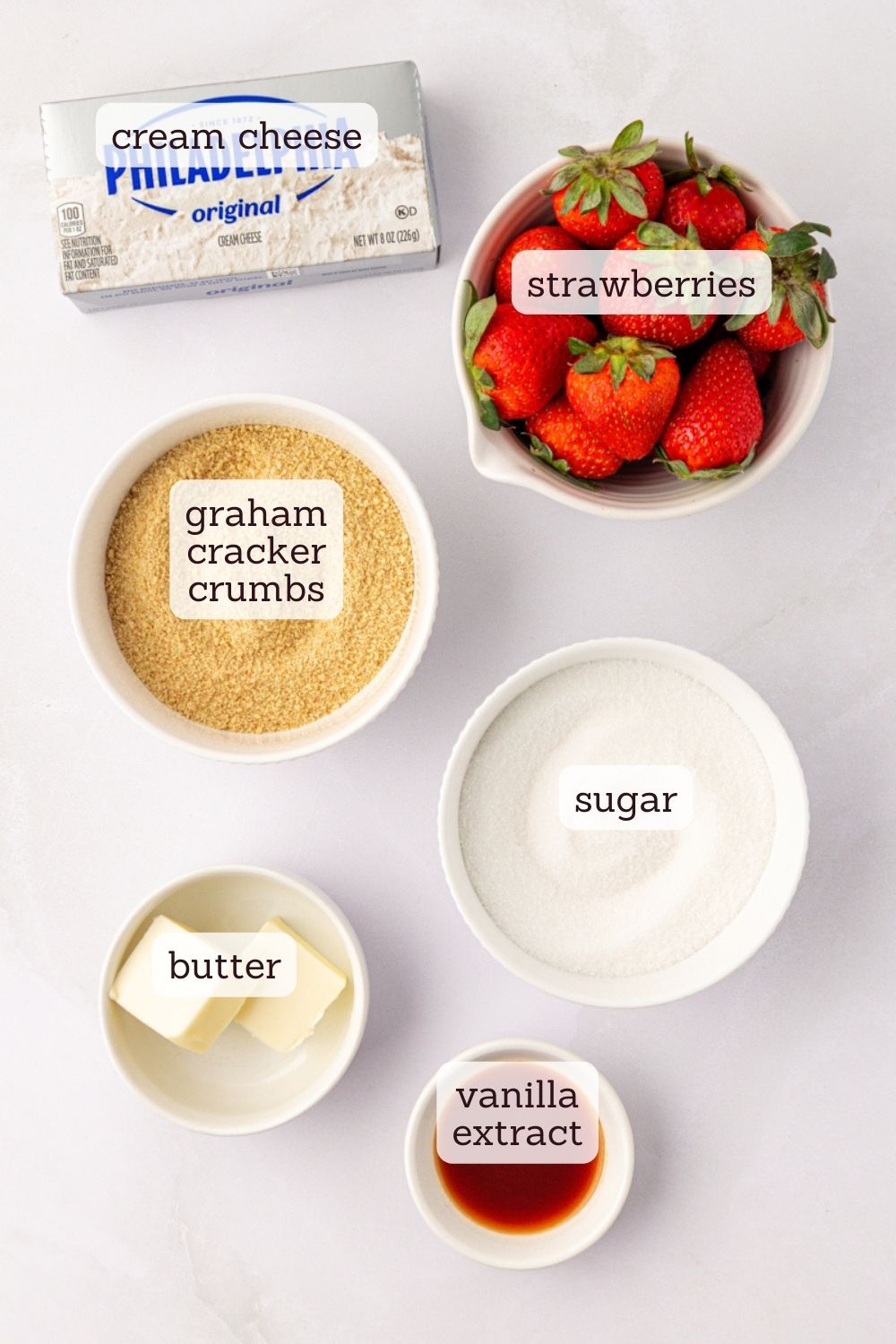 overhead view of ingredients for strawberry no-bake cheesecakes