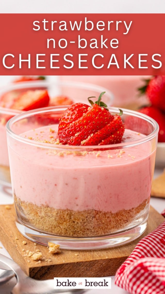 an individual strawberry no-bake cheesecake topped with fresh strawberries in a clear glass; text overlay "strawberry no-bake cheesecakes"