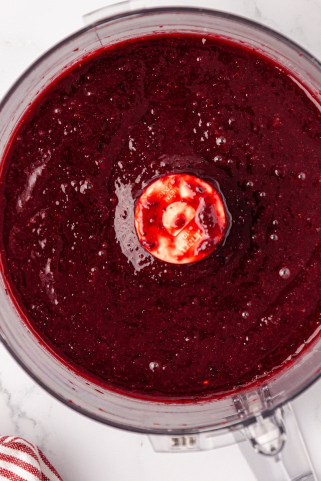 overhead view of blended cherry topping for cheesecake bars