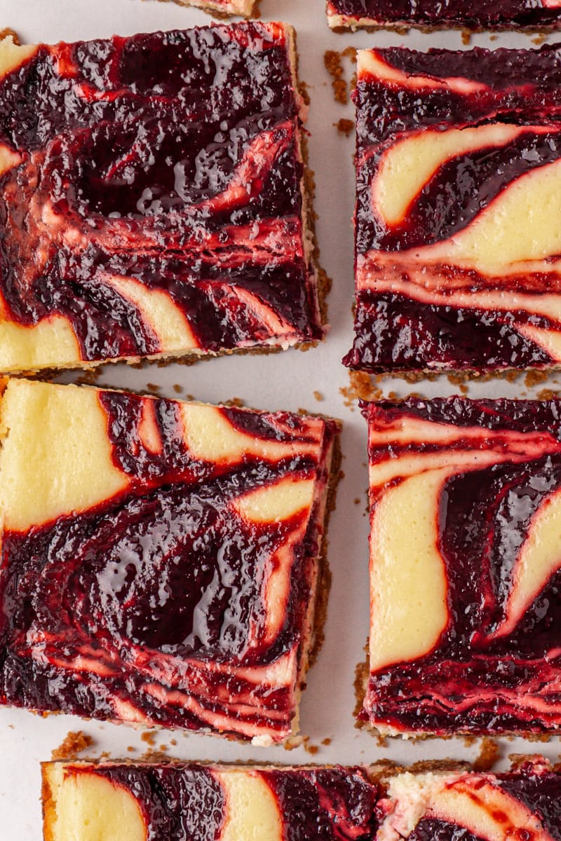 overhead view of sliced cherry cheesecake bars