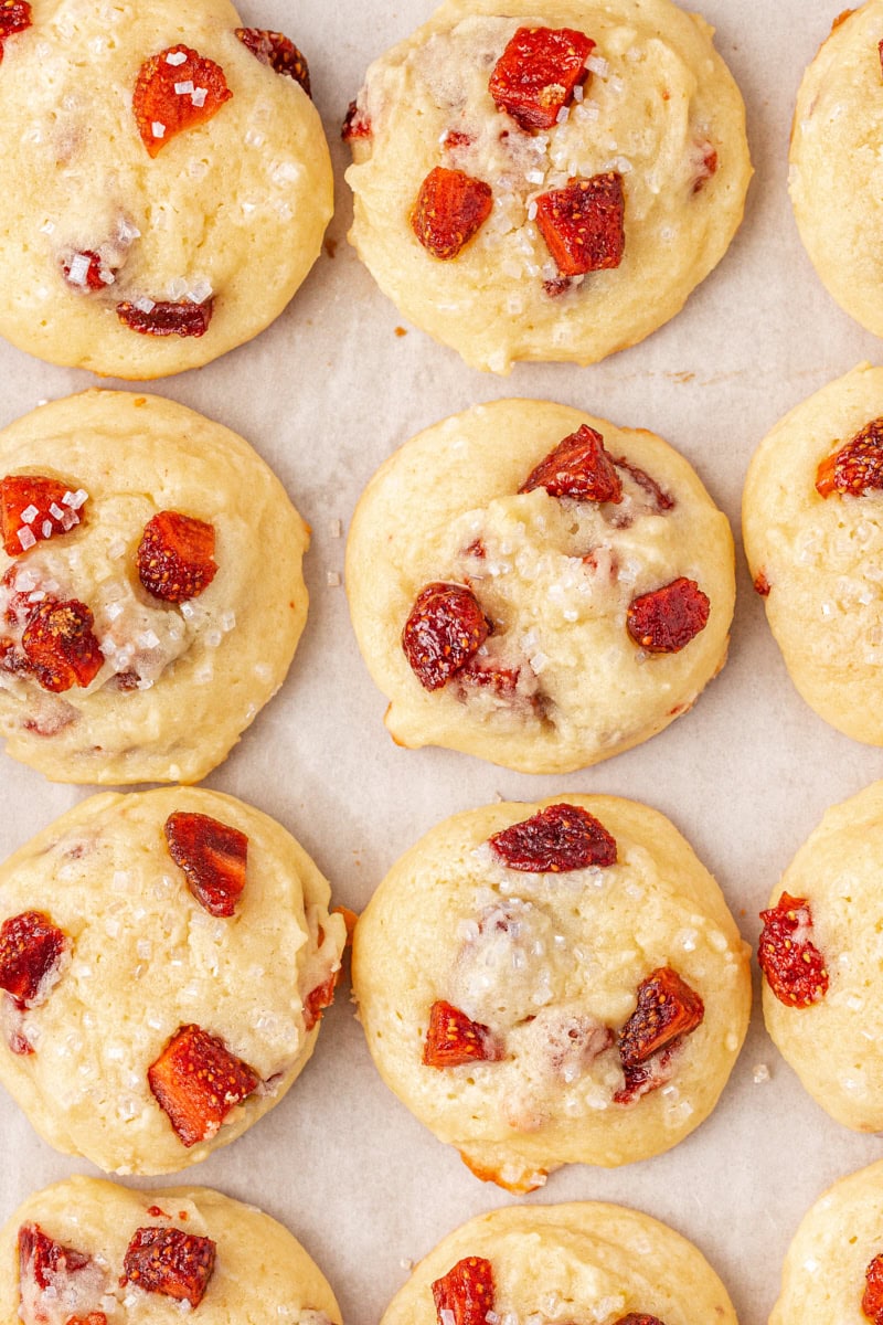 overhead view of strawberry cream cheese cookies close together on parchment paper