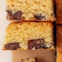 overhead view of two white chocolate brownies on their sides