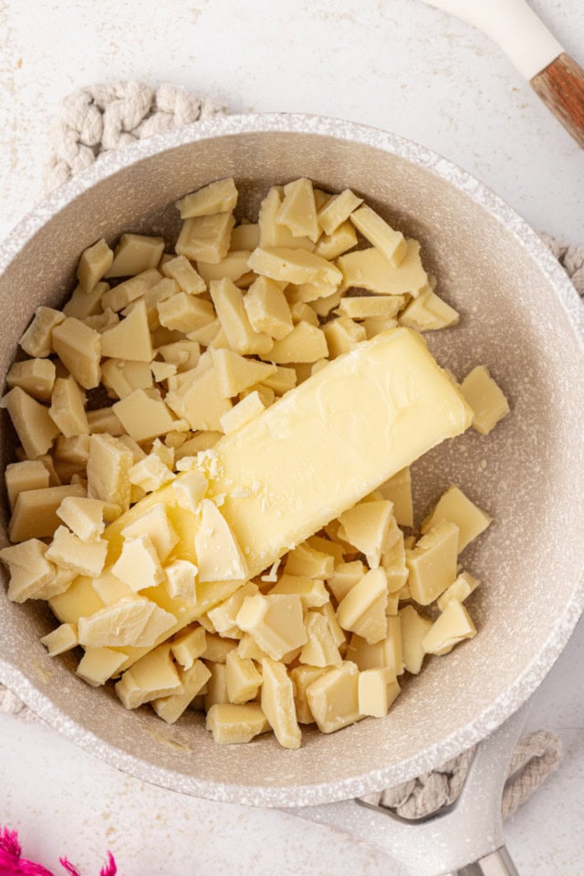 overhead view of white chocolate and butter in a saucepan