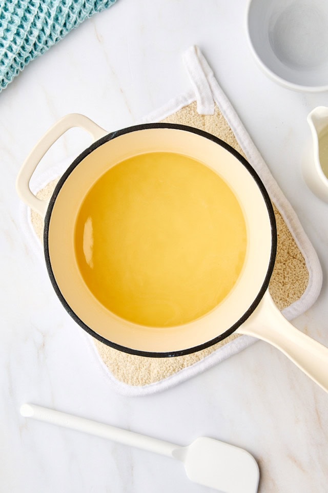 overhead view of five flavor pound cake glaze in a saucepan