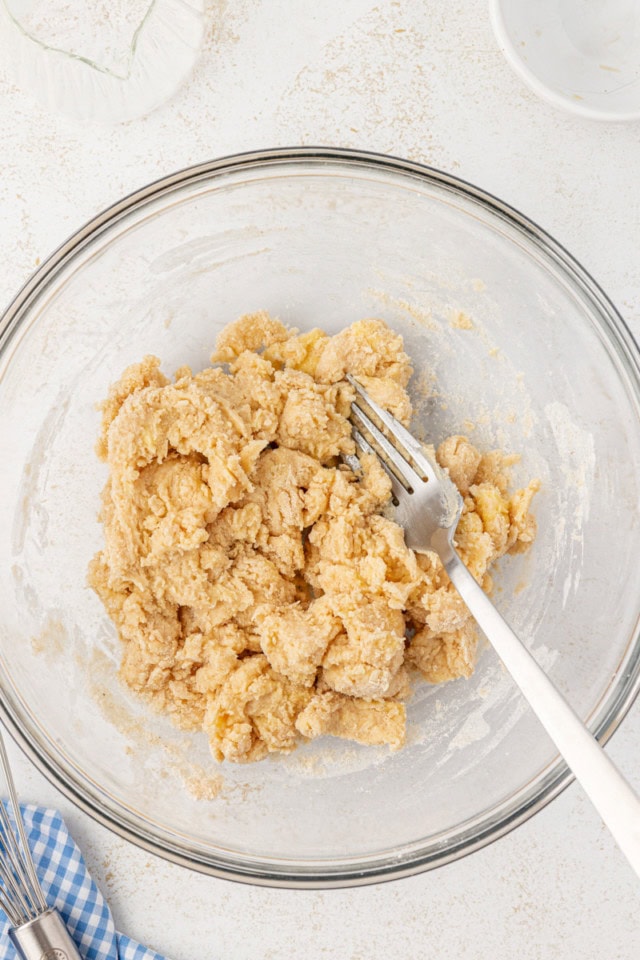 overhead view of mixed biscuit cobbler topping